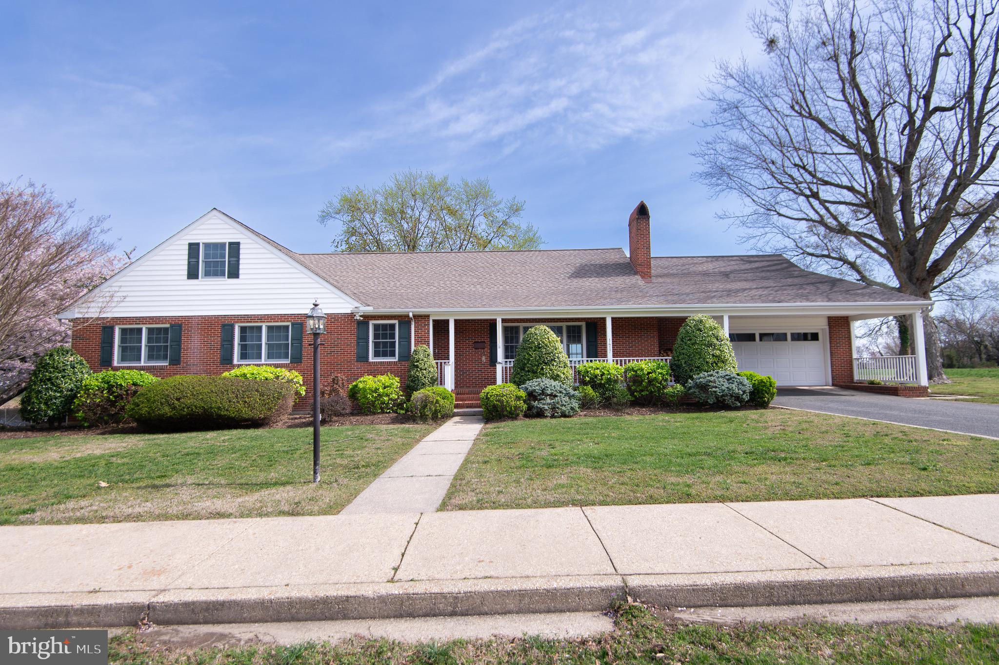 1417 School Street Cambridge, MD 21613 - Photo 4 of 73 a front view of a house with a yard