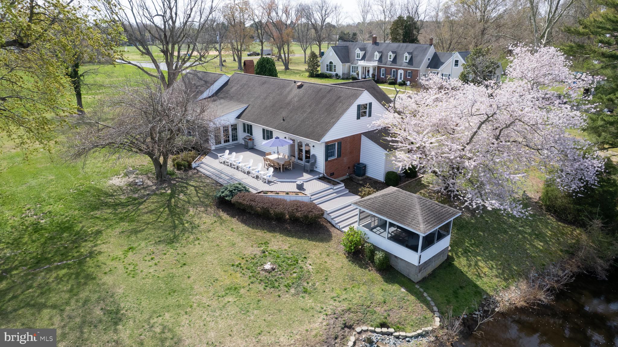 1417 School Street Cambridge, MD 21613 - Photo 53 of 73 a aerial view of a house with yard and lake view