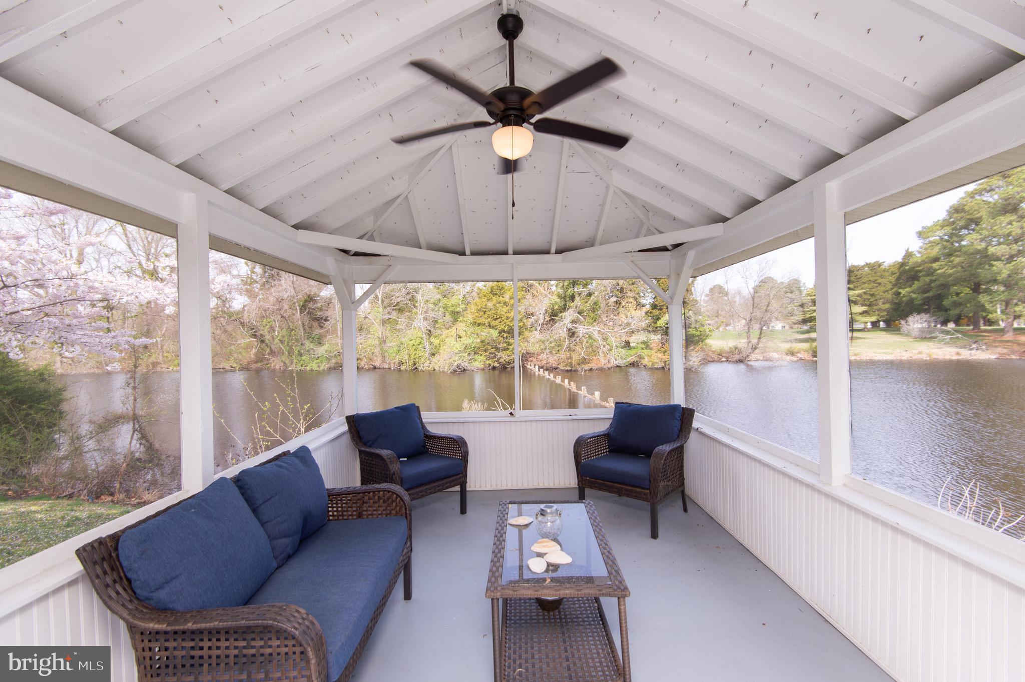 1417 School Street Cambridge, MD 21613 - Photo 63 of 73 a living room with furniture and a large window
