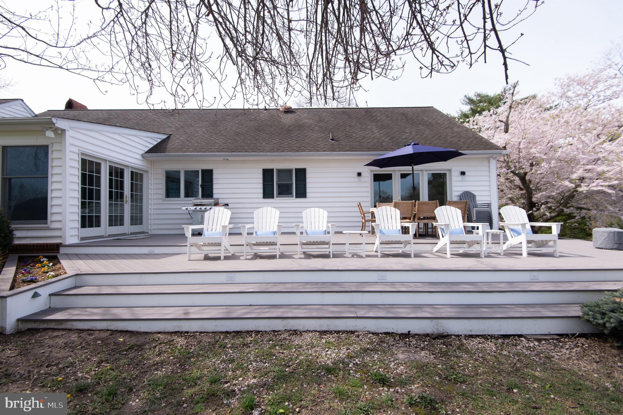 1417 School Street Cambridge, MD 21613 - Photo 67 of 73 a front view of a house with a yard outdoor seating and garage