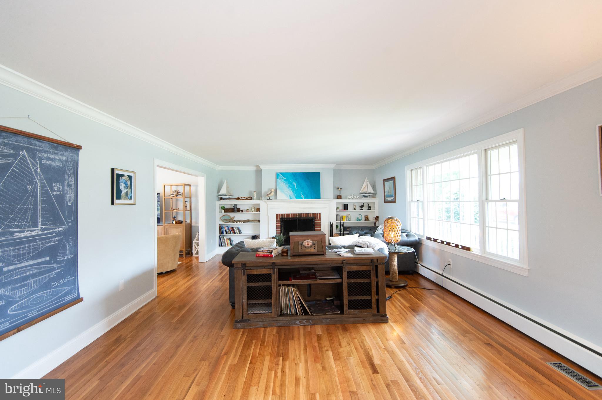 1417 School Street Cambridge, MD 21613 - Photo 8 of 73 a living room with furniture and a wooden floor