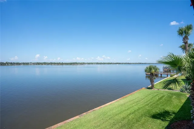 a view of a lake from a yard