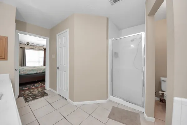 a view of a livingroom and a bathroom