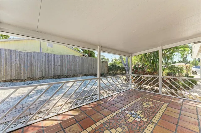 a view of a room with wooden floor and city view