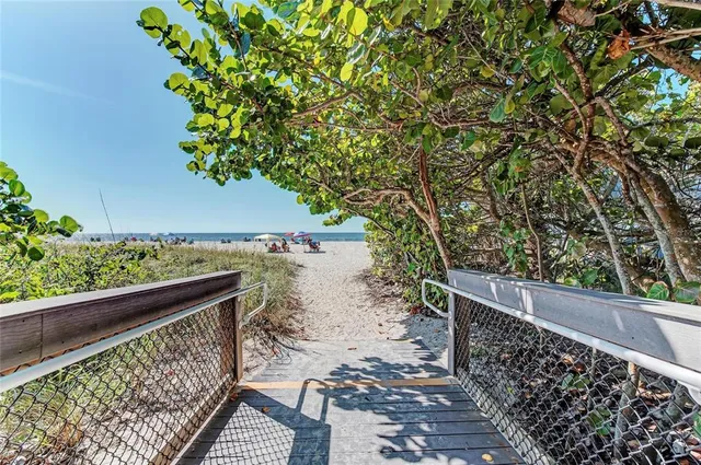 a view of balcony with wooden floor