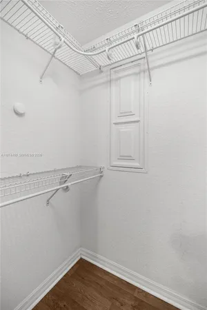 a view of a room with racks on the wall