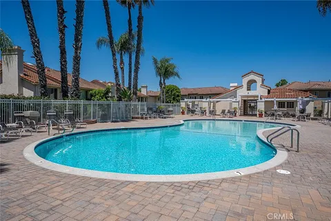 a view of a swimming pool with a garden
