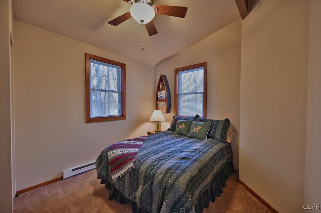 11 Hemlock Path Jim Thorpe, PA 18229 - Photo 17 of 36 a bed sitting in a bedroom next to a window