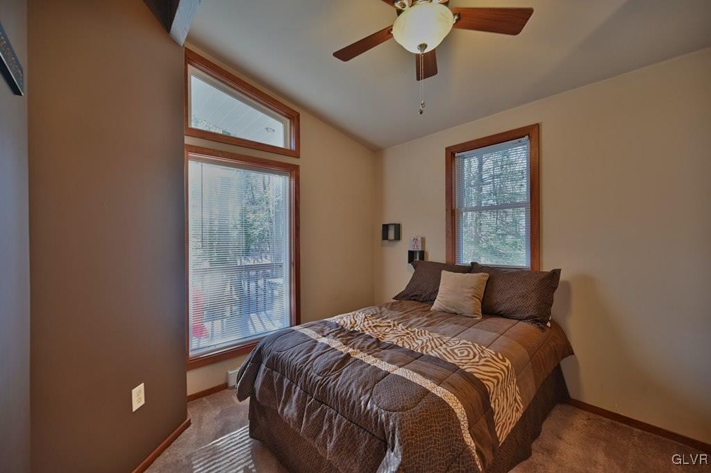 11 Hemlock Path Jim Thorpe, PA 18229 - Photo 19 of 36 a bedroom with a large bed and a window