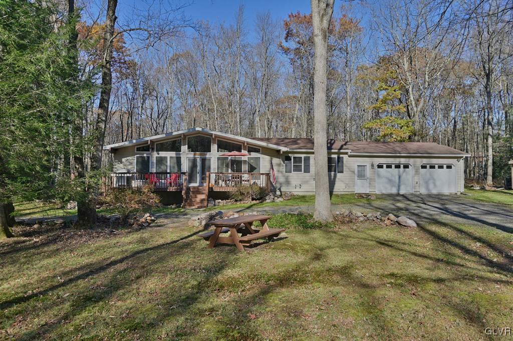 11 Hemlock Path Jim Thorpe, PA 18229 - Photo 2 of 36 a view of a house with wooden fence