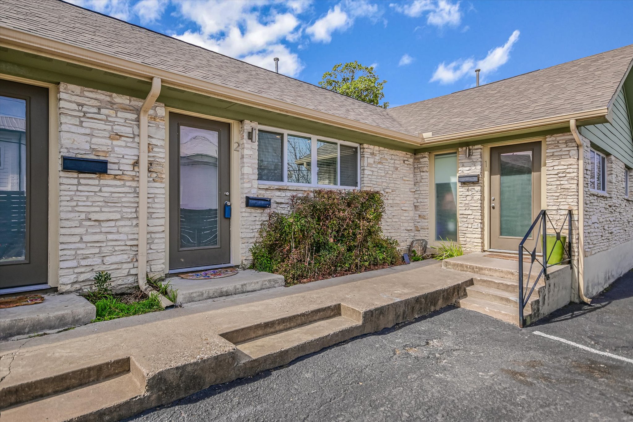 1311 East 52nd Street, Unit 2 Austin, TX 78723 - Photo 2 of 10 a view of a house with backyard and sitting area