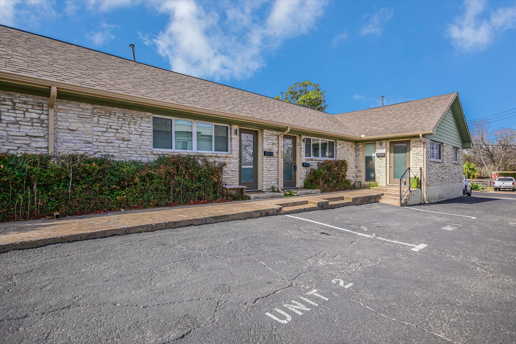 1311 East 52nd Street, Unit 2 Austin, TX 78723 - Photo 4 of 10 a view of a house with a street