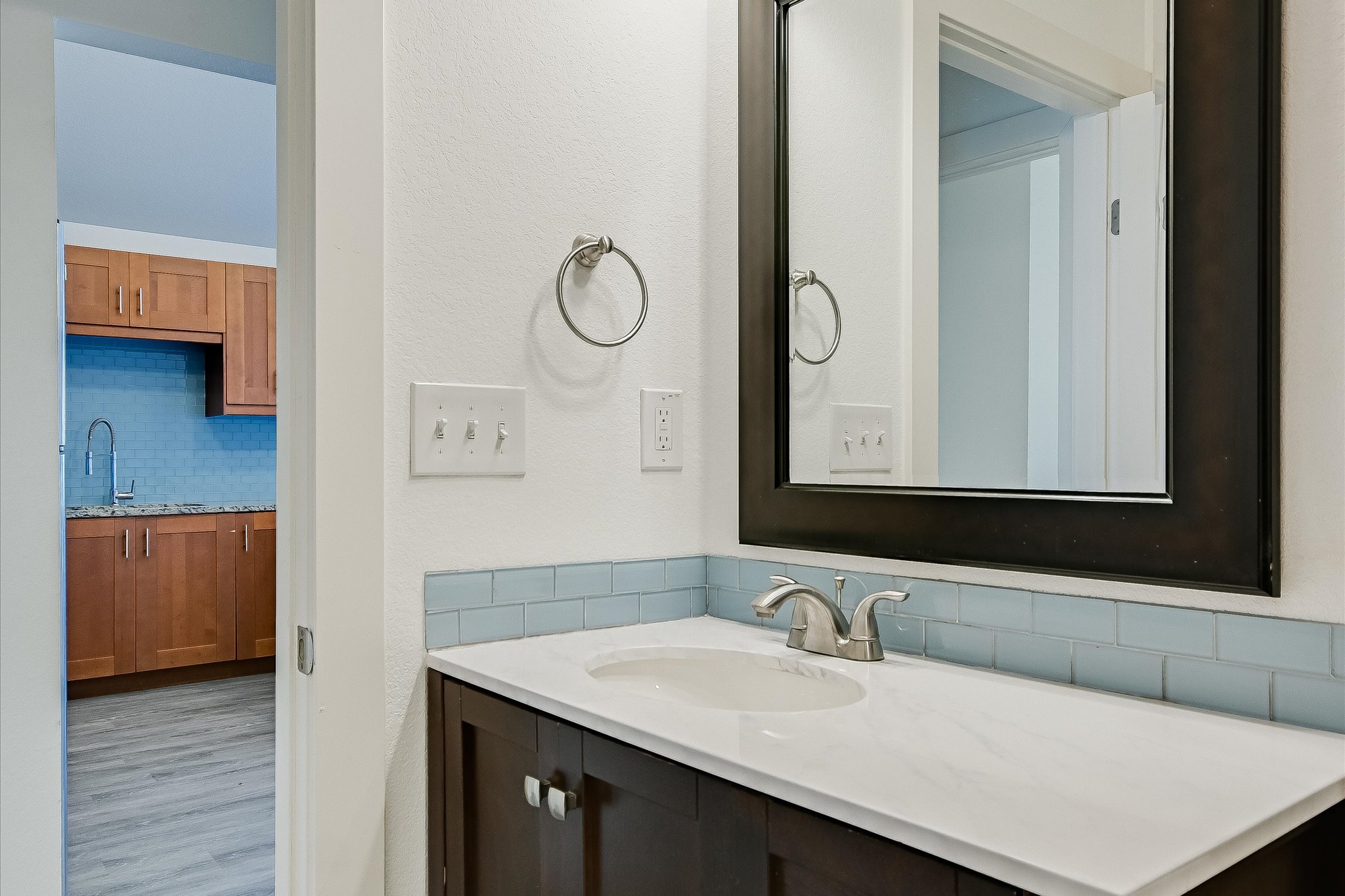 1311 East 52nd Street, Unit 2 Austin, TX 78723 - Photo 10 of 10 a bathroom with a sink and a mirror
