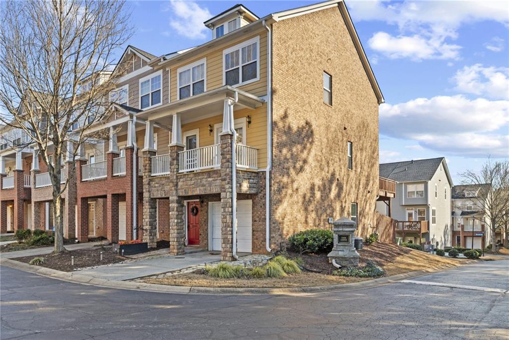 3299 Regatta Grove Alpharetta, GA 30004 - Photo 1 of 1 a view of a building along the street
