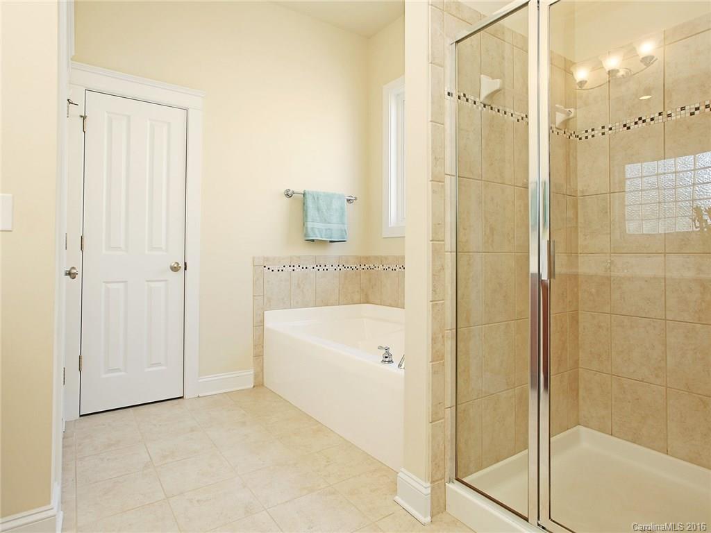 3542 Richard's Crossing Fort Mill, SC 29708 - Photo 17 of 24 a bathroom with a bathtub and shower