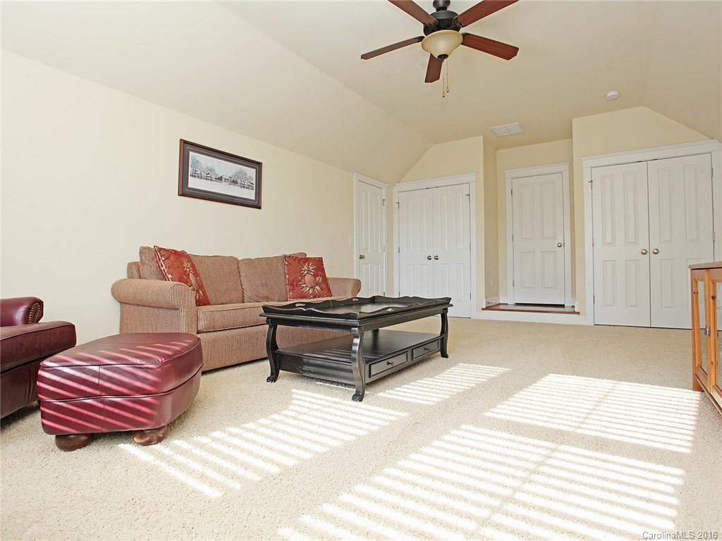 3542 Richard's Crossing Fort Mill, SC 29708 - Photo 19 of 24 a living room with furniture and a ceiling fan