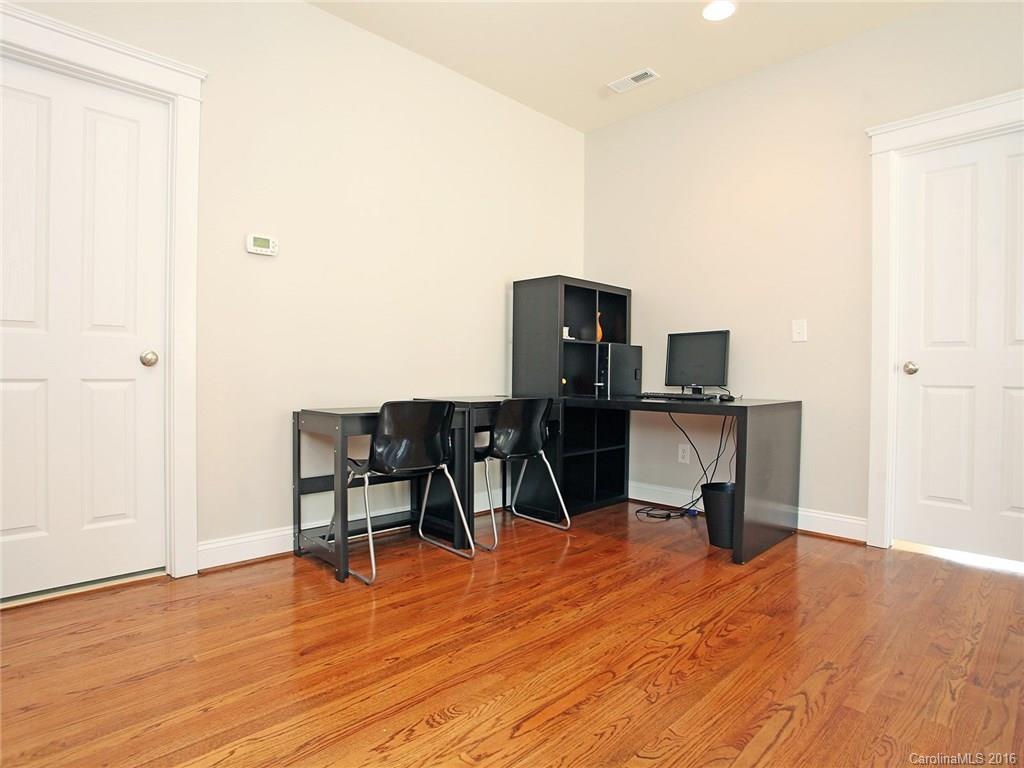 3542 Richard's Crossing Fort Mill, SC 29708 - Photo 22 of 24 a view of a workspace with furniture and wooden floor