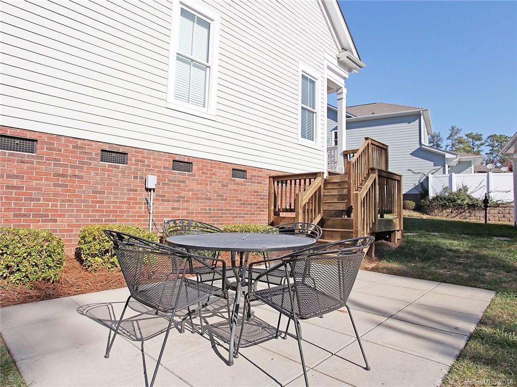 3542 Richard's Crossing Fort Mill, SC 29708 - Photo 24 of 24 a view of a dinning table and chairs in backyard of the house