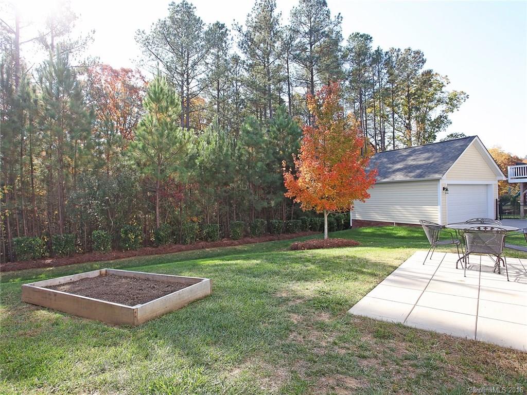 3542 Richard's Crossing Fort Mill, SC 29708 - Photo 4 of 24 a view of a backyard with large trees