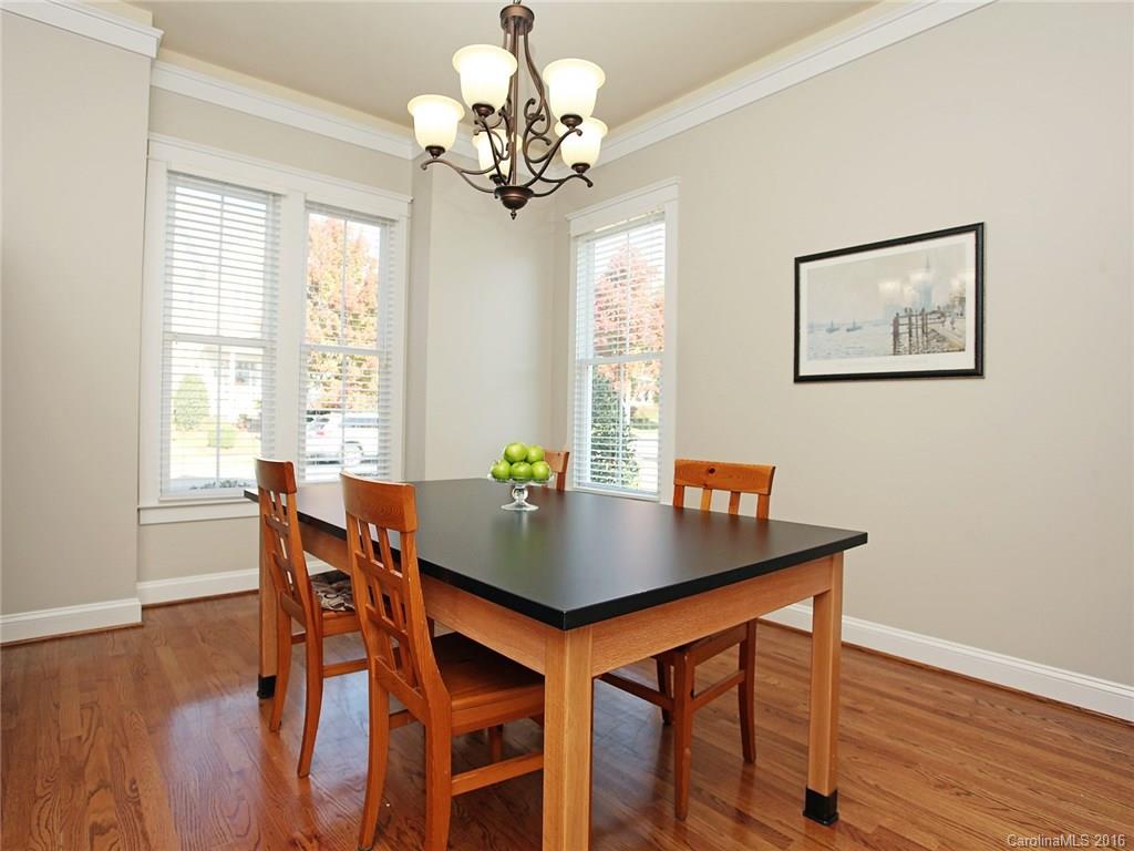 3542 Richard's Crossing Fort Mill, SC 29708 - Photo 8 of 24 a view of a dining room with furniture window and wooden floor