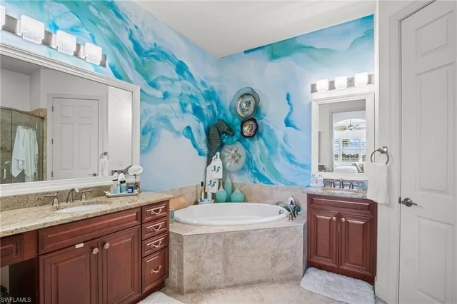 a bathroom with a sink a vanity and a mirror