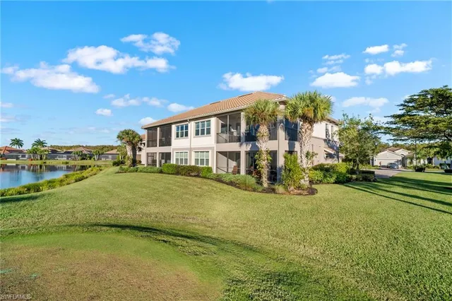 a view of a house with a big yard