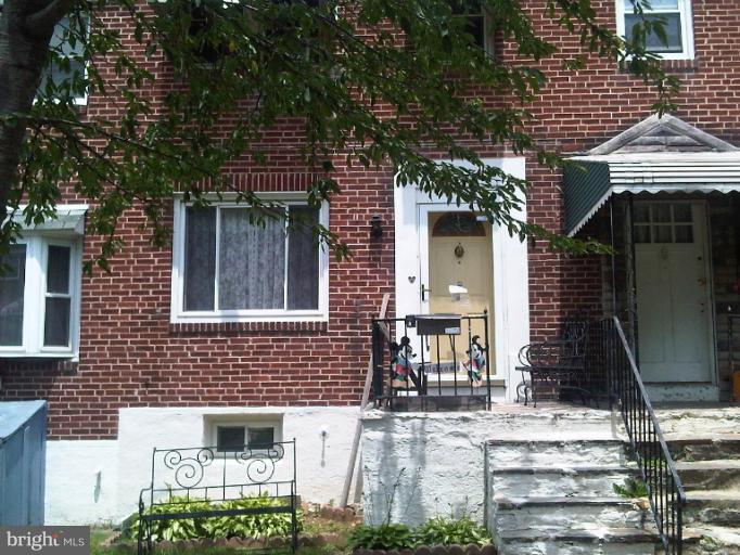 220 Arden Road West Baltimore, MD 21225 - Photo 1 of 1 a front view of a house with a yard