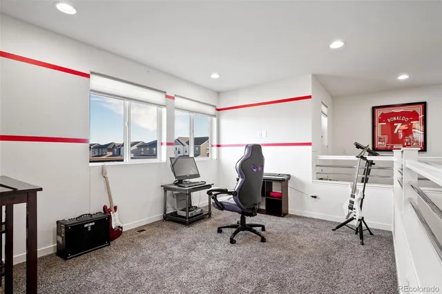 a view of a workspace with furniture