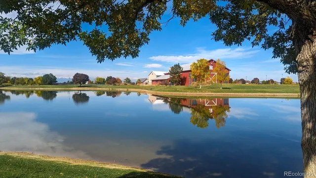 a view of a lake with a big yard