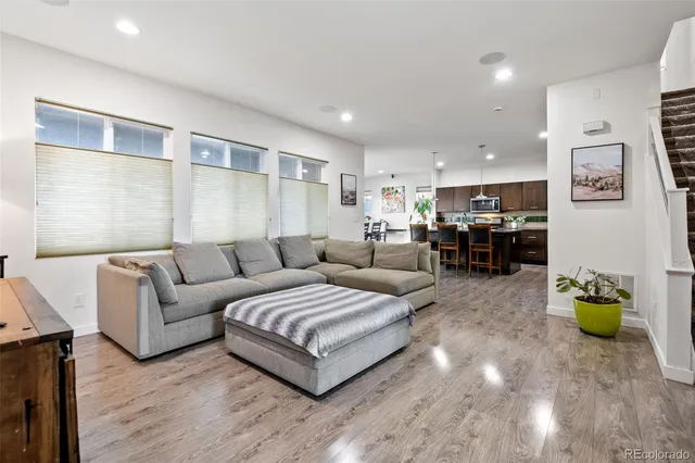 a living room with furniture and a couch