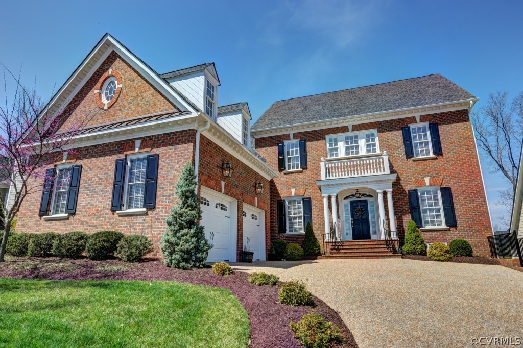 3724 Bircham Loop Midlothian, VA 23113 - Photo 1 of 24 a front view of a house with a yard