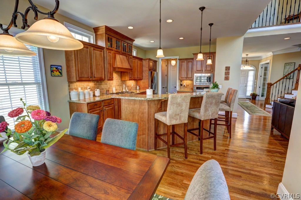 3724 Bircham Loop Midlothian, VA 23113 - Photo 11 of 24 a living room with furniture kitchen and a chandelier