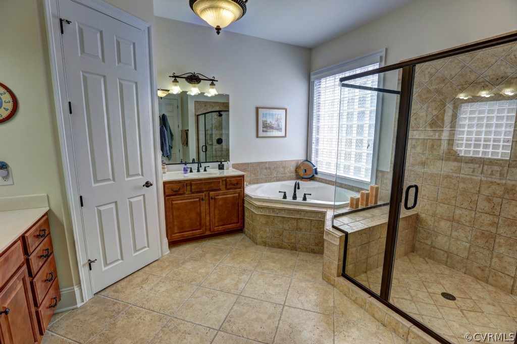 3724 Bircham Loop Midlothian, VA 23113 - Photo 18 of 24 a large bathroom with a tub sink and mirror