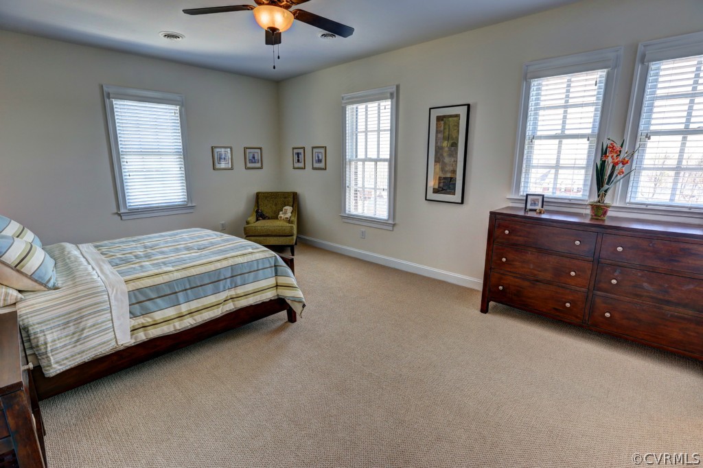 3724 Bircham Loop Midlothian, VA 23113 - Photo 20 of 24 a bedroom with a bed dresser and a window