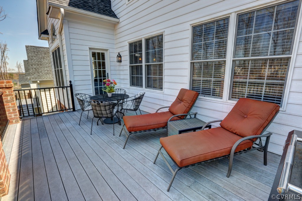 3724 Bircham Loop Midlothian, VA 23113 - Photo 2 of 24 a blue bench sitting in front of a house