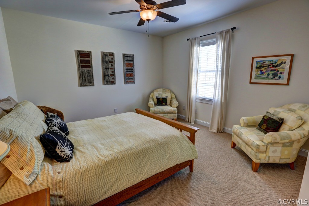 3724 Bircham Loop Midlothian, VA 23113 - Photo 21 of 24 a bedroom with a bed and window