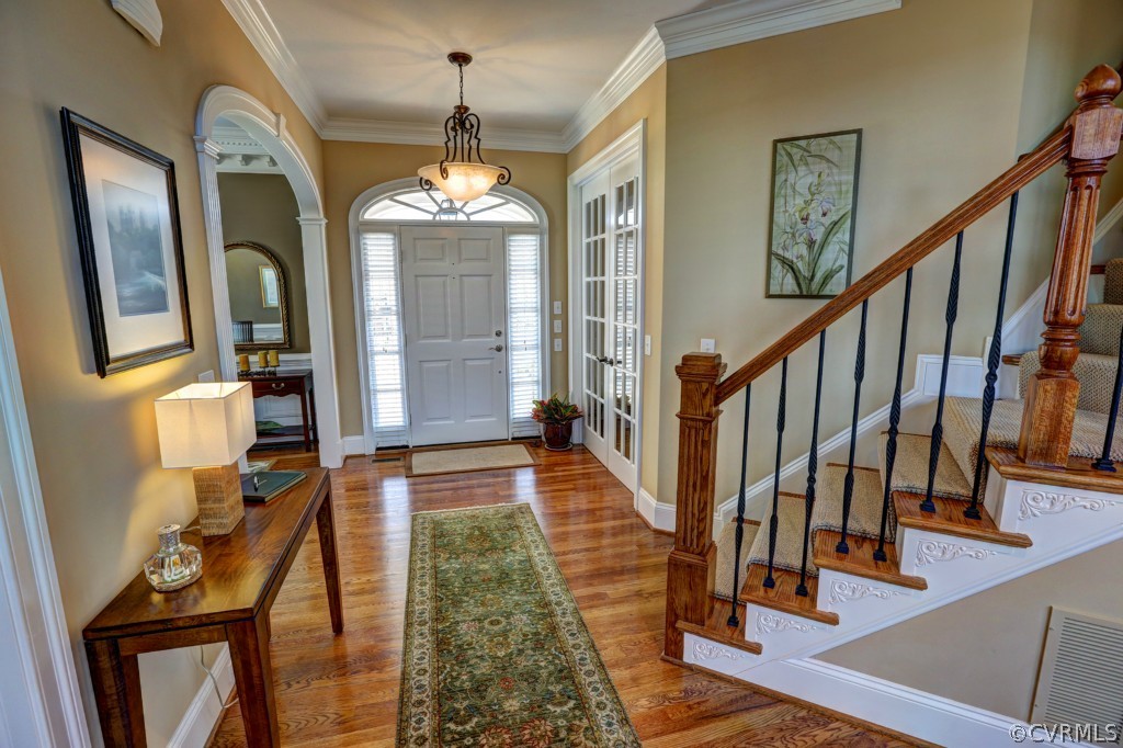 3724 Bircham Loop Midlothian, VA 23113 - Photo 4 of 24 a view of a livingroom with furniture stairs