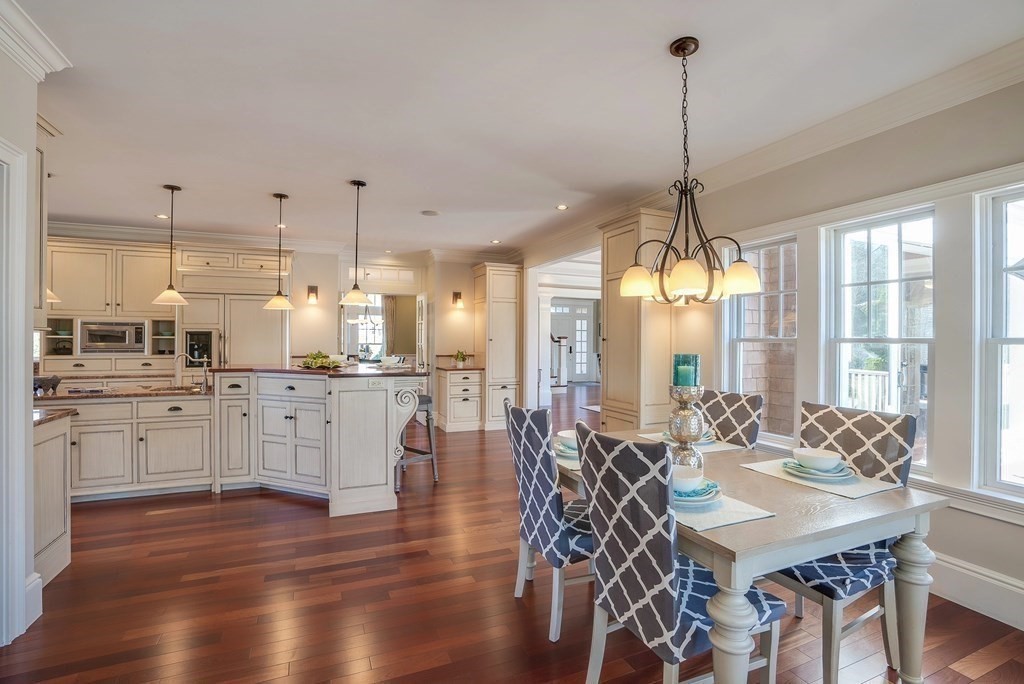 6 High Meadow Road Andover, MA 01810 - Photo 17 of 41 a very nice looking dining room with hardwood floor and a view of kitchen