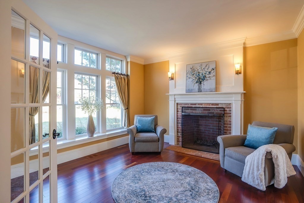 6 High Meadow Road Andover, MA 01810 - Photo 20 of 41 a living room with furniture and a fireplace