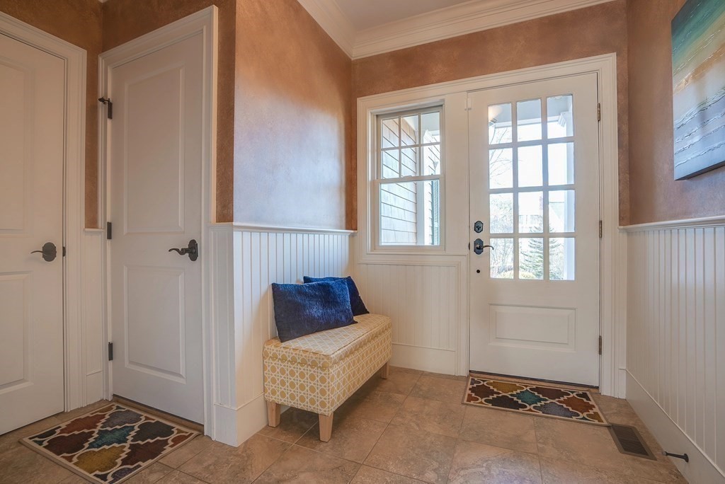 6 High Meadow Road Andover, MA 01810 - Photo 24 of 41 a room with a window and a wooden door