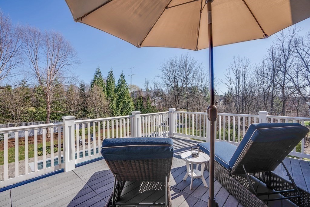 6 High Meadow Road Andover, MA 01810 - Photo 29 of 41 a view of a chair in wooden deck