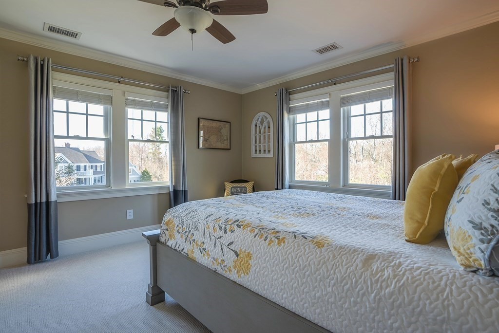6 High Meadow Road Andover, MA 01810 - Photo 33 of 41 a bedroom with a bed and window