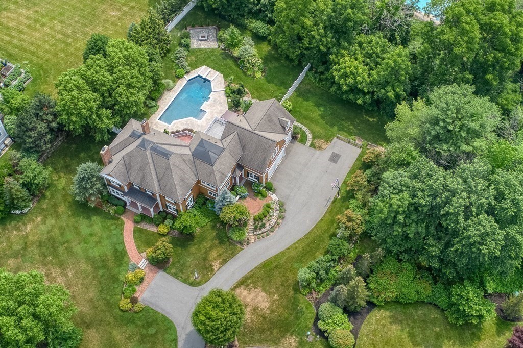 6 High Meadow Road Andover, MA 01810 - Photo 4 of 41 an aerial view of a house with a yard and large trees