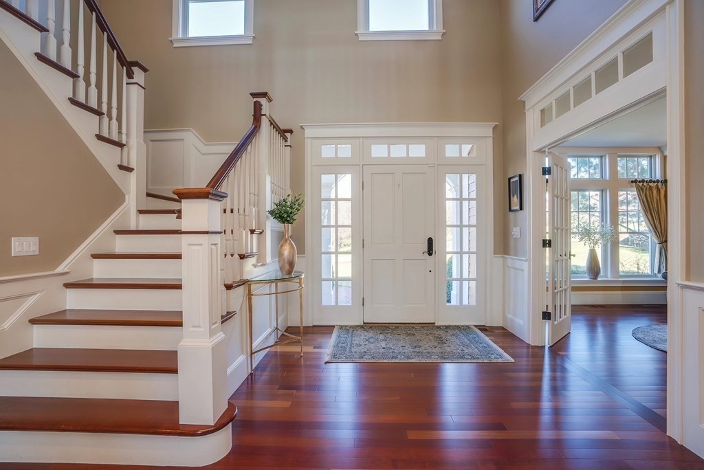 6 High Meadow Road Andover, MA 01810 - Photo 10 of 41 a view of entryway with wooden floor and stairs