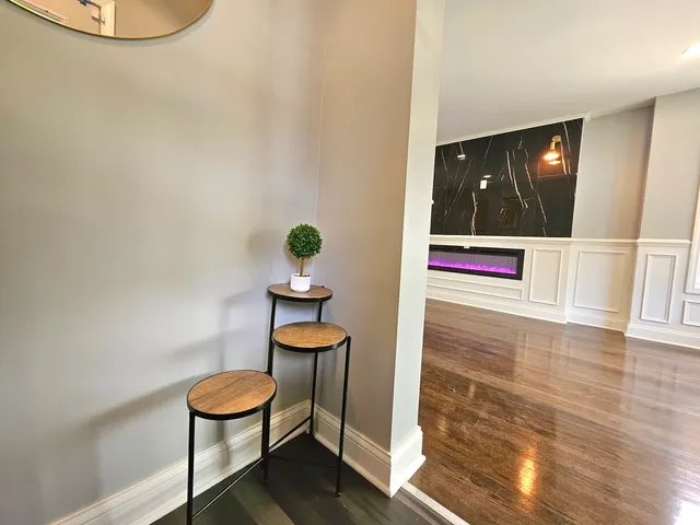 a view of entryway with wooden floor