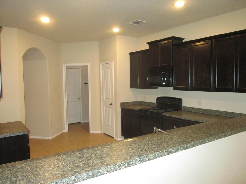 1825 Birch Wood Road Anna, TX 75409 - Photo 10 of 18 Kitchen from dining view