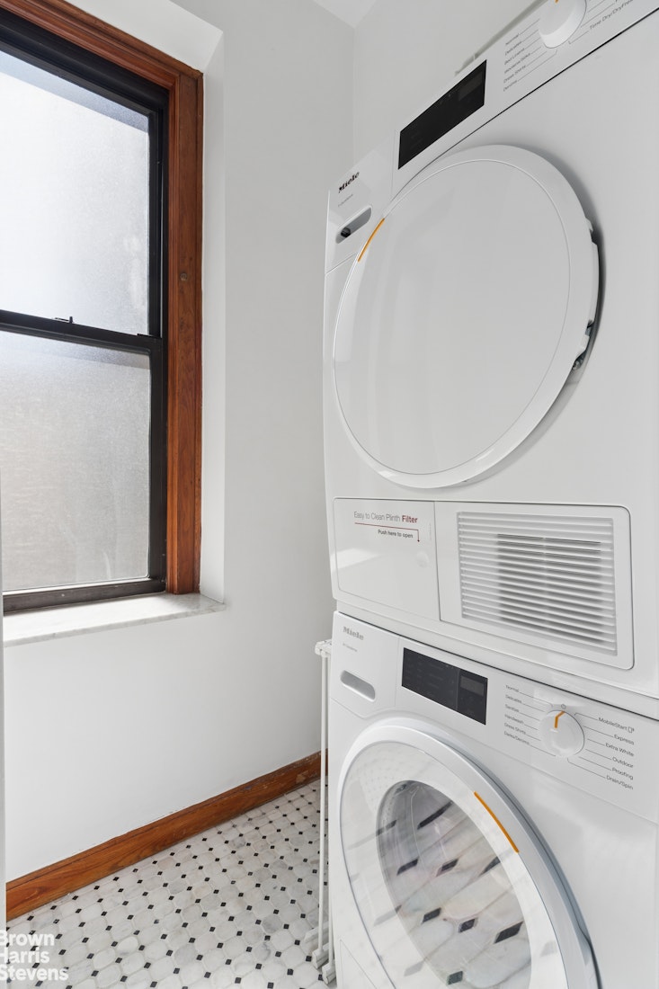 790 Riverside Drive, Unit 4J Manhattan, NY 10032 - Photo 4 of 11 a bathroom with a toilet and a sink