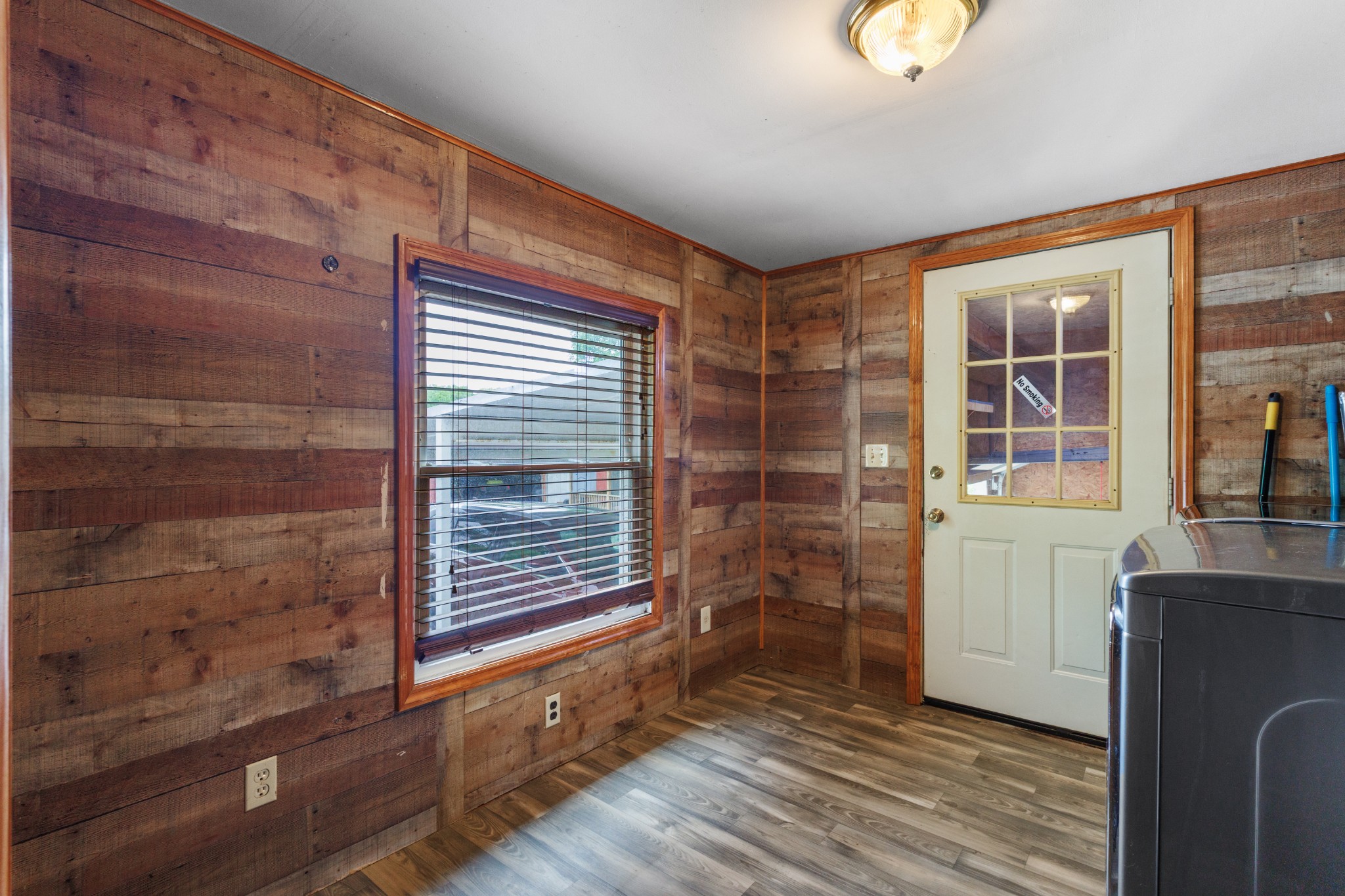 494 Lovejoy Road Sparta, TN 38583 - Photo 33 of 54 an empty room with wooden floor and windows