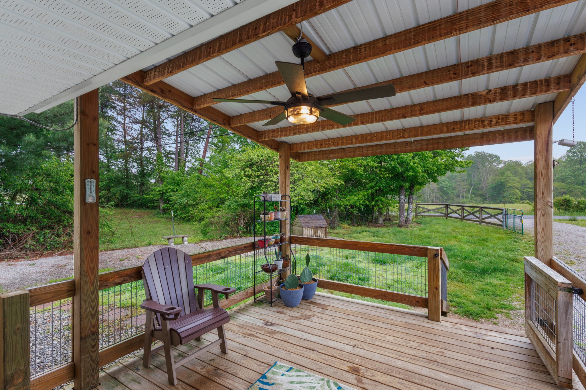 494 Lovejoy Road Sparta, TN 38583 - Photo 5 of 54 a view of a chairs and table in the deck
