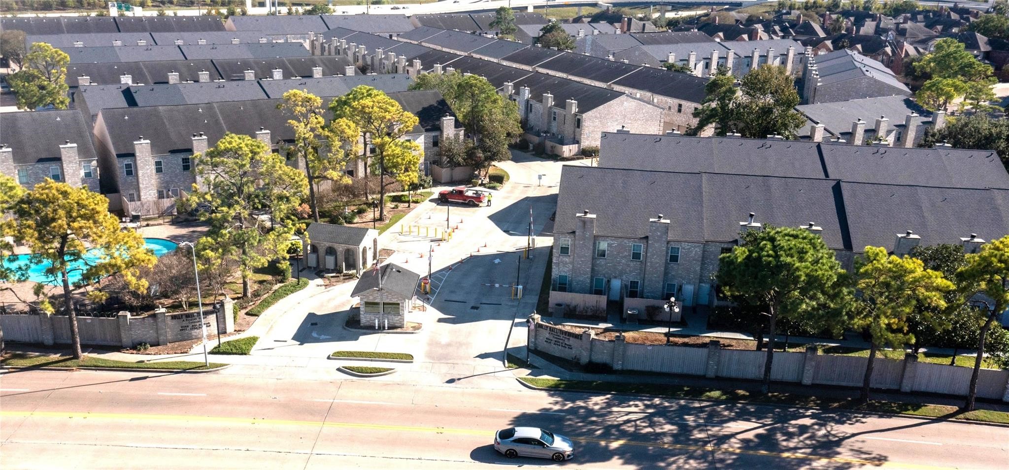a view of a swimming pool with a patio